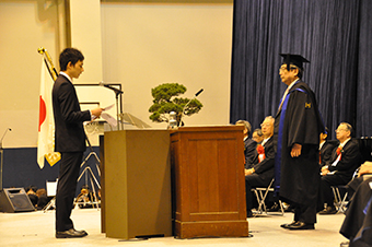 A student representative delivering a statement at the undergraduate student entrance ceremony