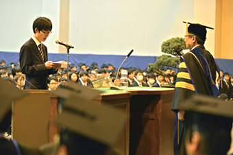 Representative for bachelor's students delivering a statement