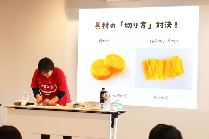 Student life coach Miki (left) interpreting Kasuya's talk