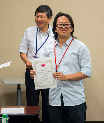 Yuanbo Tang (Tony) of the University of Oxford accepting a Best Poster Award