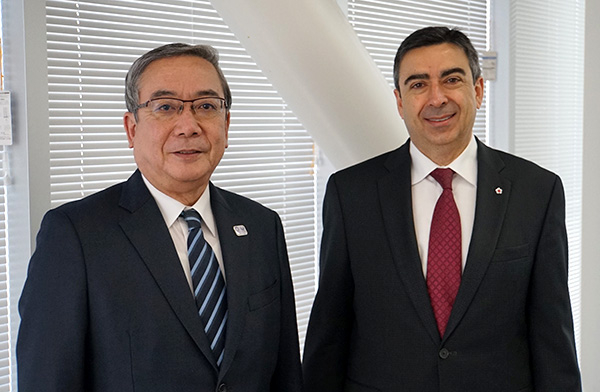 Deputy Head of Mission Pagé (right) with President Mishima