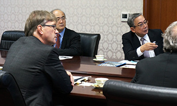 Rector Brinksma (left) across from President Mishima