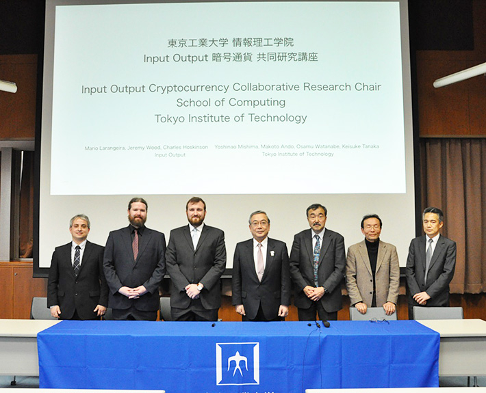From left, Mario Larangeira (Specially Appointed Associate Professor of Tokyo Tech and Research Fellow of IOHK) ,  Feremy Wood (CSO and Co-founder of IOHK) ,  Charles Hoskinson (CEO and Co-founder  of IOHK), Yoshinao Mishima (President of Tokyo Tech),  Makoto Ando (Executive  Vice President of Tokyo Tech) ,  Osamu Watanabe (Dean of School of computing, Tokyo Tech) and Keisuke Tanaka (Professor of School of computing, Tokyo Tech)