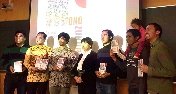 Participants showing their copies
