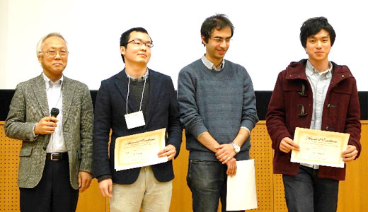 Vice President Mizumoto (far left) awarding poster presentations