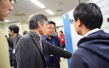 Poster sessions (left) and Dean Wada in discussion with students
