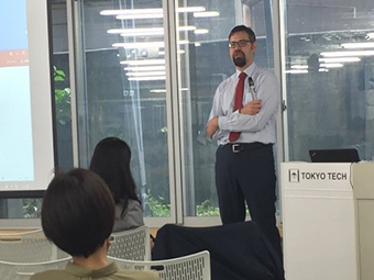 IEA's Varro speaking to lecture participants