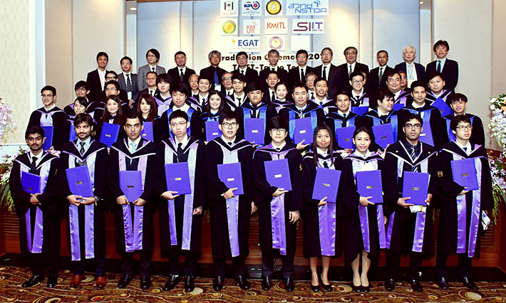 TAIST graduates with program faculty members