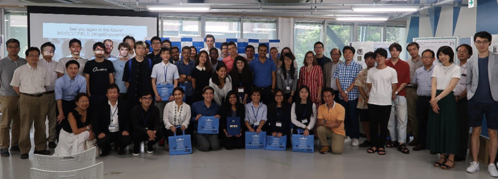 Participants, host faculty members, and lab mates at closing ceremony