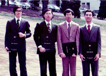 Professor Chong (second from right) with lab members on graduation day