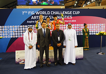 With the World Floor champion Kenzo Shirai at the FIG Gymnastics World Challenge Cup, Doha in March 2014