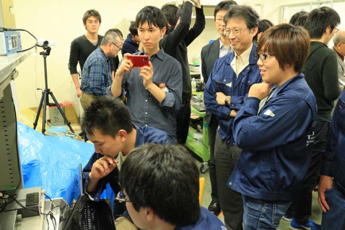 The TSUBAME development team listening to the Morse code from TSUBAME at the Tokyo Tech's ground operating station (11/6 21:00 JST)