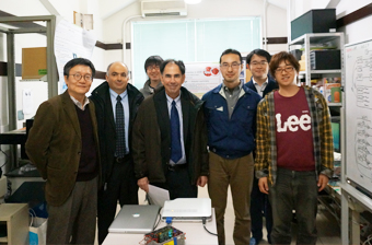 With students at the Laboratory of Prof. Nobuyuki Kawai (far left), Department of Physics