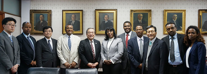 President Mishima (center left), Minister Demitu (center right), and Ambassador Markos (fifth from right)