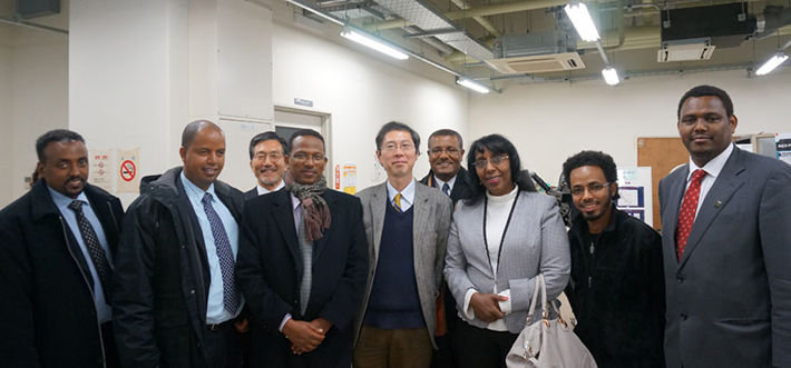 Professor Hiroshi Yamaura (center), Minister Demitu (third from right) and a Tokyo Tech student from Ethiopia (second from right)