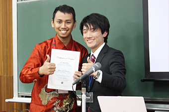 Ishimaru (right) with a participant