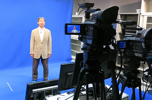 Professor Hirose recording a segment in the Online Education Development Office (OEDO) studio