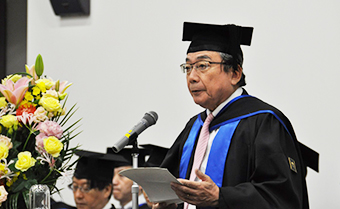 President Yoshinao Mishima giving his congratulatory address