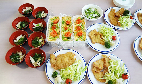 Clear Japanese broth, pressed sushi, and milanesa empanizada