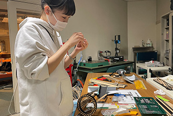 Assembling parts cut with a laser processing machine