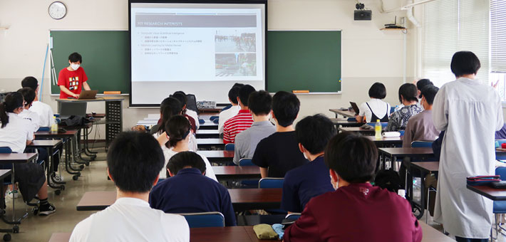 Participant answering questions from high school students