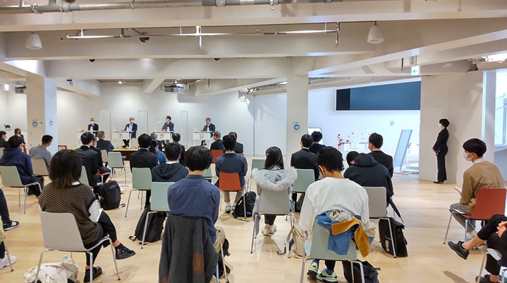 In-person participants at Hisao & Hiroko Taki Plaza B2F event space
