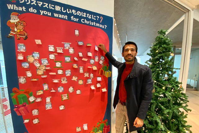 International student submitting his Christmas wish