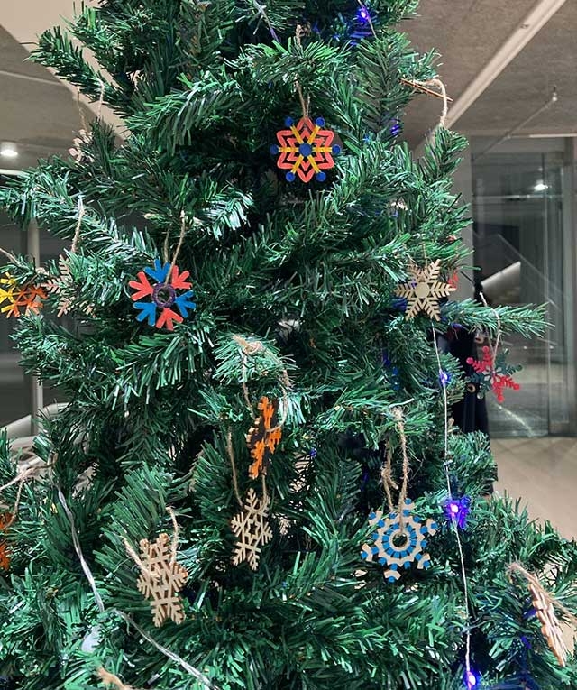 Tree decorated with students' original ornaments