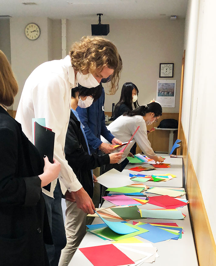 Students choosing colored paper