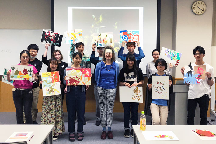 Zuse Meyer (center) with Art with an Artist participants and artworks