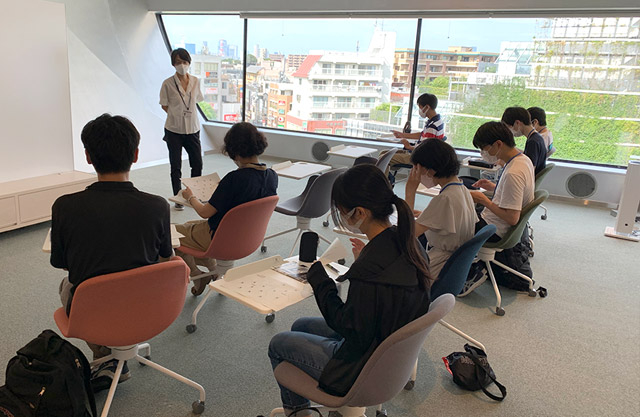 High school students getting briefed on museum exhibits