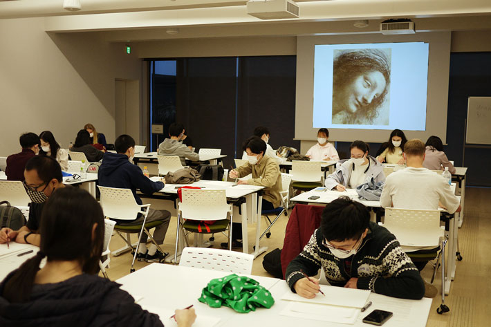 Participants working on their drawings