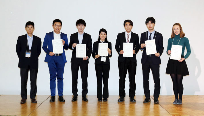 TAC-MI Director Takeo Yamaguchi (far left) with award winners