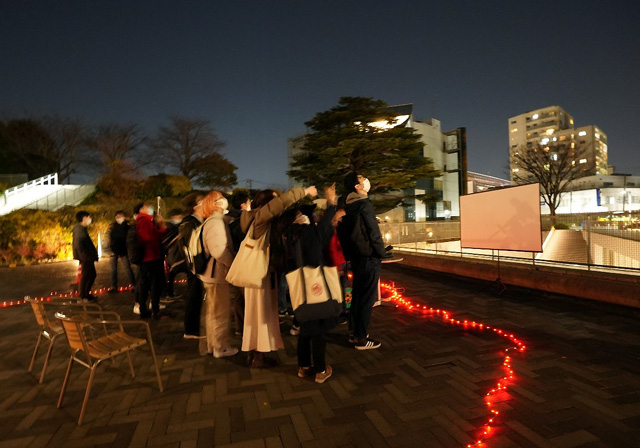 Participants outdoors searching for Orion Nebula