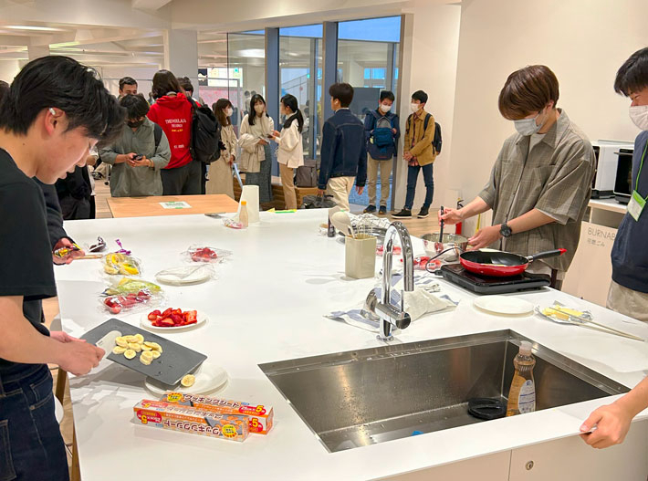 Students making crepes at Taki's kitchen
