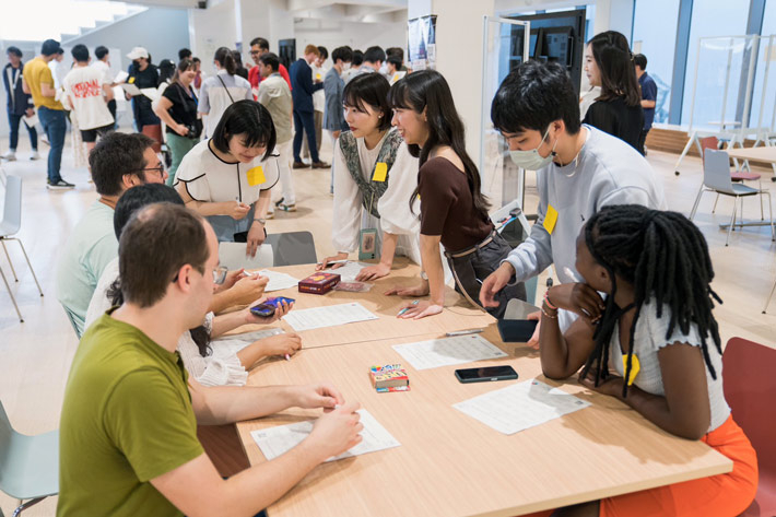 Participants enjoying Name Bingo and board games