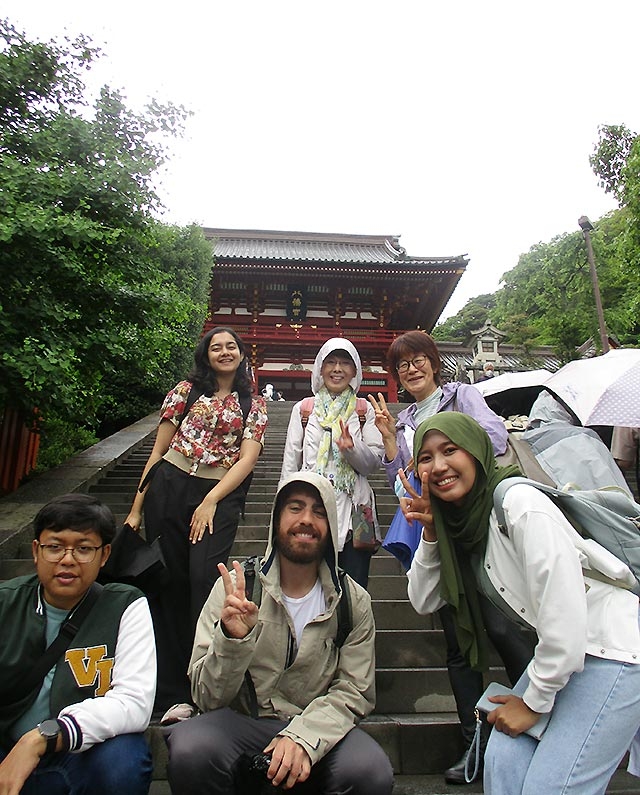Participants in front of main shrine at Tsuruoka Hachimangu