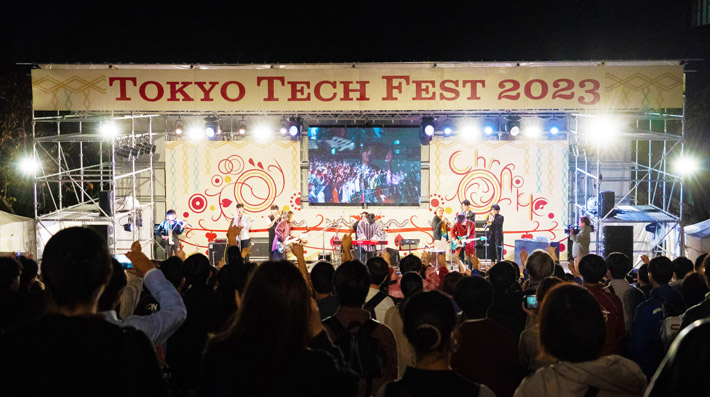 Band performing for evening crowd