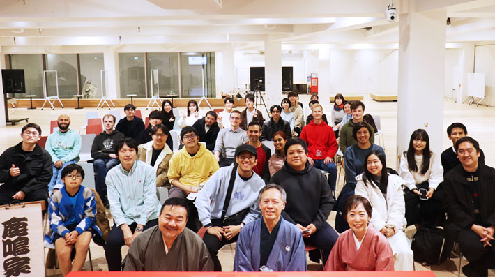 Group photo of performers and participants