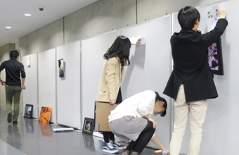 Students setting up display walls