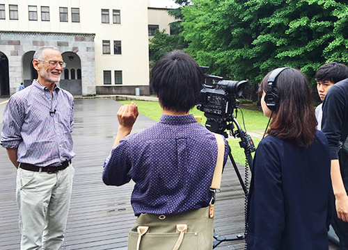 Prof. Stewart recording a video segment with TA Students