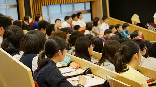 High school students listening intently