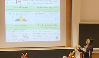 Associate Professor Takayasu delivering presentation