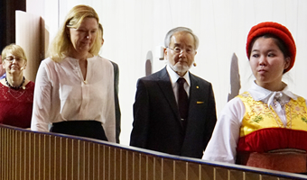 The Nobel Laureate arriving at the hall