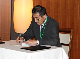 Executive Vice President Ando at signing ceremony