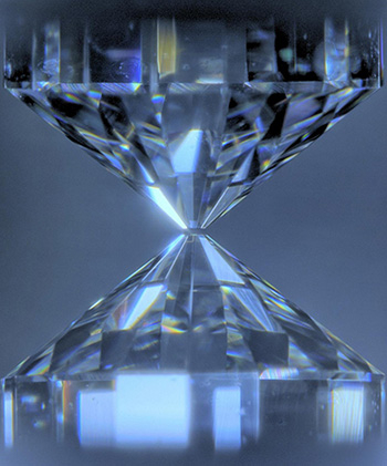 Diamonds to squeeze a sample to ultrahigh pressures corresponding to those of the Earth's core (greater than 135 gigapascals). The samples are heated under pressure to high temperatures of the core (about 4,000 kelvins and higher) by being irradiated by a laser through diamonds.