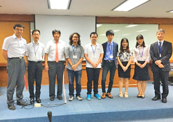 Iida (second from right) with group members