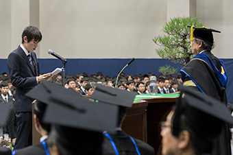 Representative for bachelor's students delivering a statement