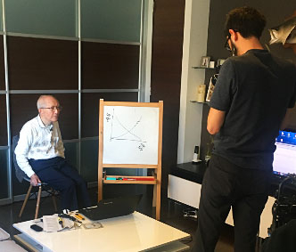 Professor Emeritus Masahiro Mori speaking to CNN