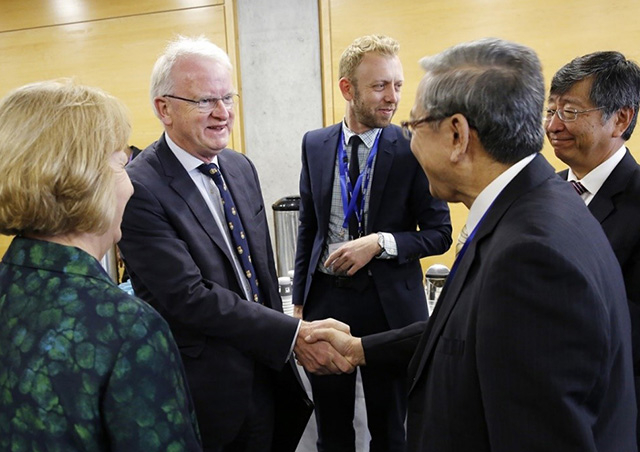 Provost Stirling (center left) welcoming President Mishima